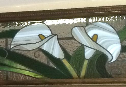 detail of stained glass lilies